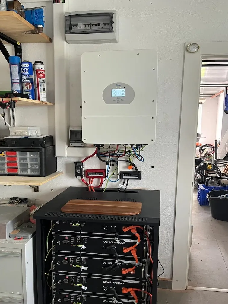 Hybrid inverter and self-consumption batteries installed in a plant room