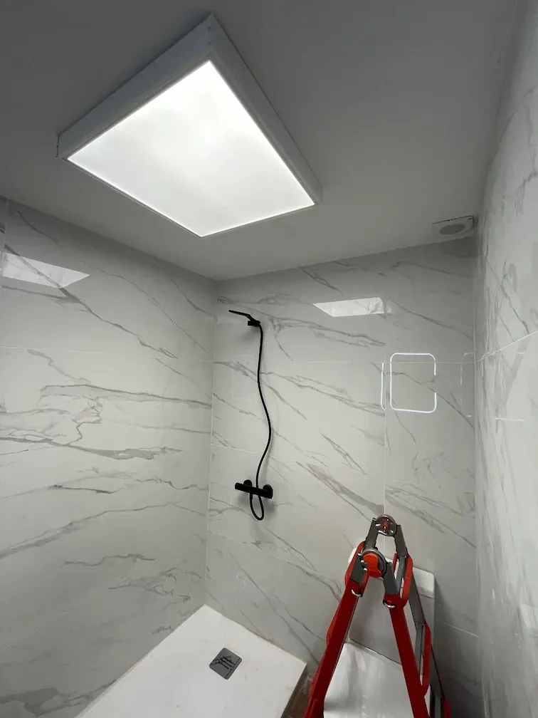 Bathroom with LED lighting recessed into the ceiling
